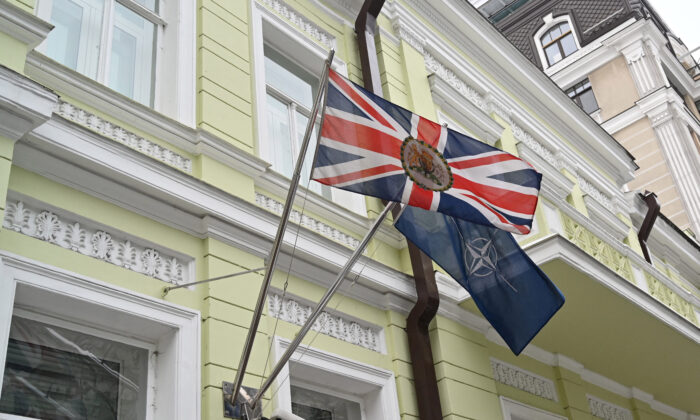 Flags of the United Kingdom and NATO on the building of the UK Embassy in Kyiv on Jan. 24, 2022. (Sergei Supinsky/AFP via Getty Images)