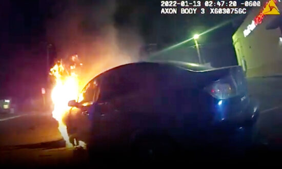 Heart-Pounding Bodycam Footage Shows Police Officer Selflessly Pull Unconscious Woman From Burning Car