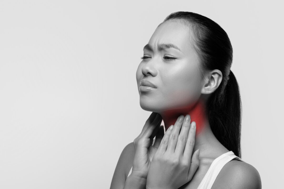 It manifests as a feeling of something being caught in your throat that won’t go away no matter what you do. By Prostock-studio/Shutterstock