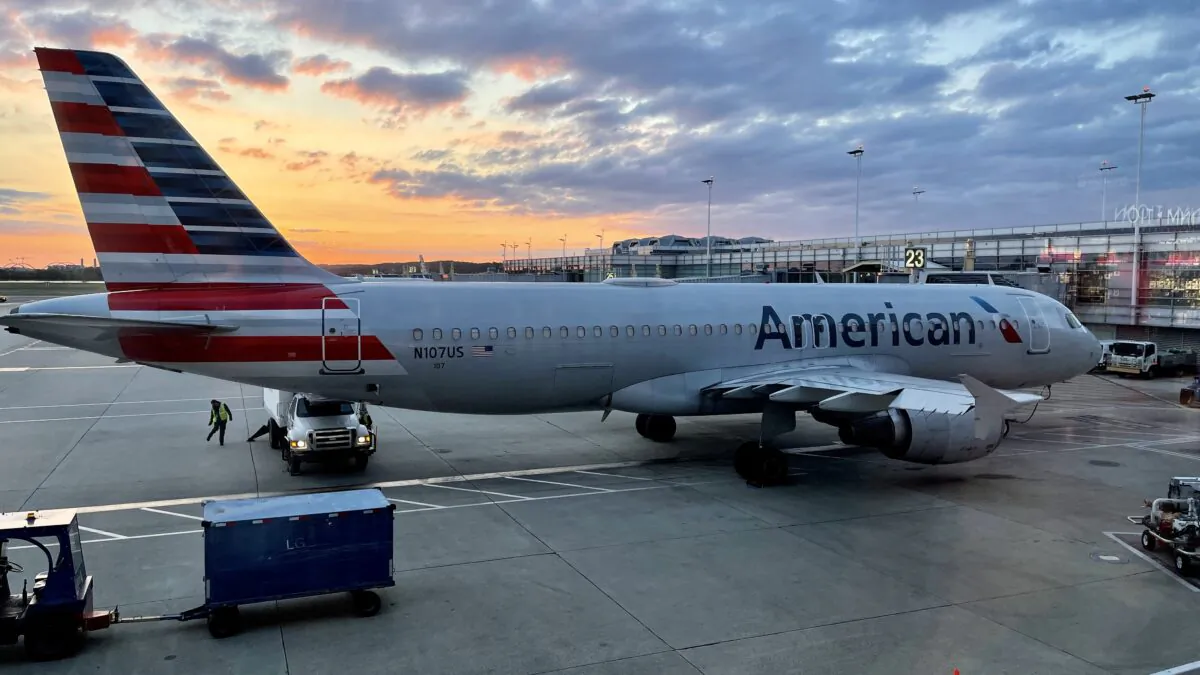An American Airlines plane is seen at sunrise parked on the tarmac of the Reagan Washington National Airport (DCA) in Arlington, Va., on April 22, 2021. (Daniel Slim/AFP via Getty Images)