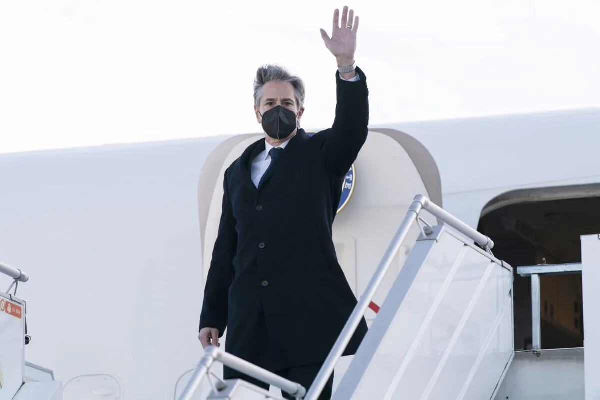 Secretary of State Antony Blinken waves as he departs the Geneva Airport in Geneva, on Jan. 21, 2022. (Alex Brandon/AP Photo)