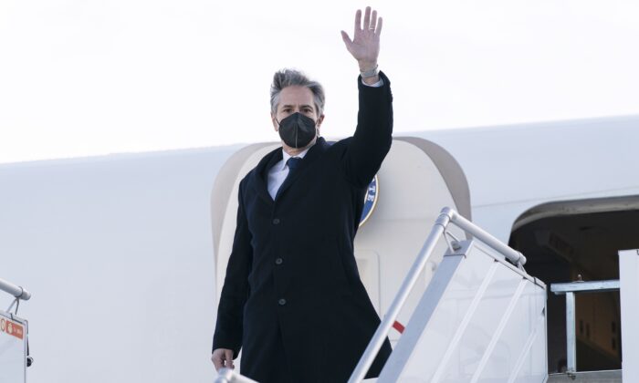 Secretary of State Antony Blinken waves as he departs the Geneva Airport in Geneva, on Jan. 21, 2022. (Alex Brandon/AP Photo)
