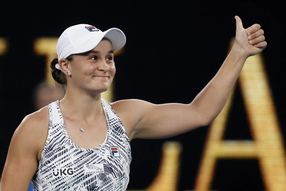 Ash Barty of Australia celebrates after defeating Jessica Pegula of the United States in their quarterfinal match at the Australian Open tennis championships in Melbourne, Australia, on Jan. 25, 2022. (Hamish Blair/AP Photo)
