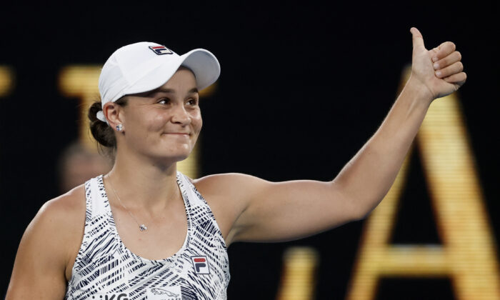 Ash Barty of Australia celebrates after defeating Jessica Pegula of the United States in their quarterfinal match at the Australian Open tennis championships in Melbourne, Australia, on Jan. 25, 2022. (Hamish Blair/AP Photo)