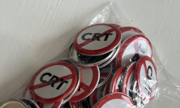 Parents concerned about Critical Race Theory took home these buttons from a school board activist training Jan. 19, 2022 in Sarasota, Florida. (Alexis Spiegelman)  