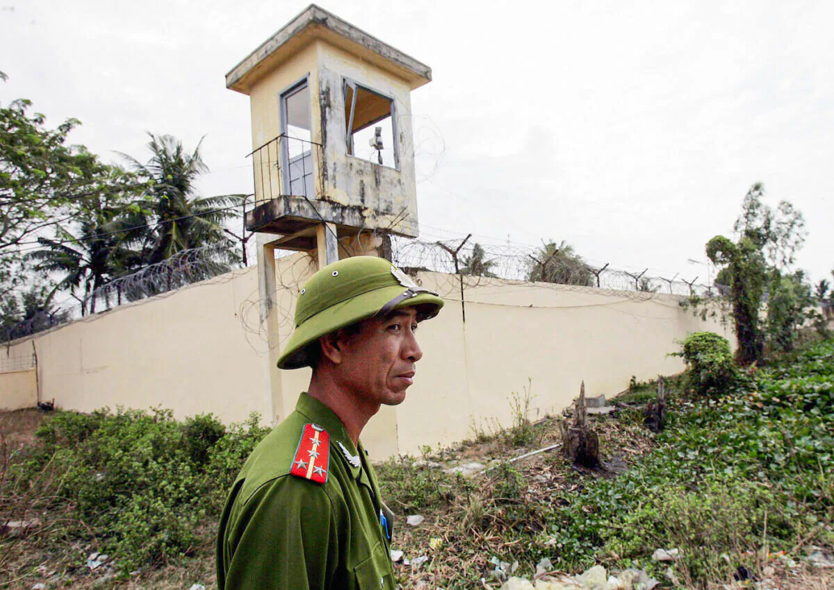 A 2006 file image of a Vietnamese policeman stands watch outside the Phuoc Co jail on the outskirts of the southern coastal town of Vung Tau. (Hoang Dinh Nam/AFP via Getty Images)