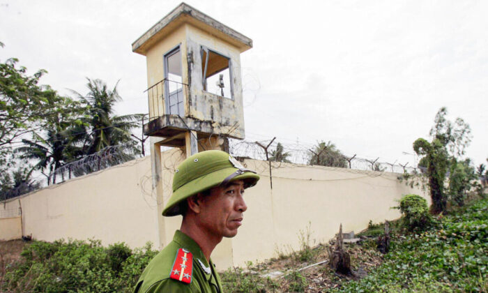 A 2006 file image of a Vietnamese policeman stands watch outside the Phuoc Co jail on the outskirts of the southern coastal town of Vung Tau. (Hoang Dinh Nam/AFP via Getty Images)