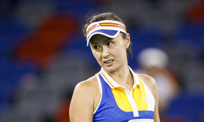 Peng Shuai of China reacts during the match against Monica Puig of Puerto Rico in round 2 of Women's Single during Day 3 in Wuhan, China on Sept. 26, 2017.  (Kevin Lee/Getty Images)