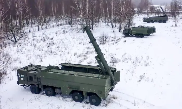 In this photo taken from a video provided by the Russian Defense Ministry Press Service on Jan. 25, 2022, the Russian army's Iskander missile launchers take positions during drills in Russia. (Russian Defense Ministry Press Service via AP)