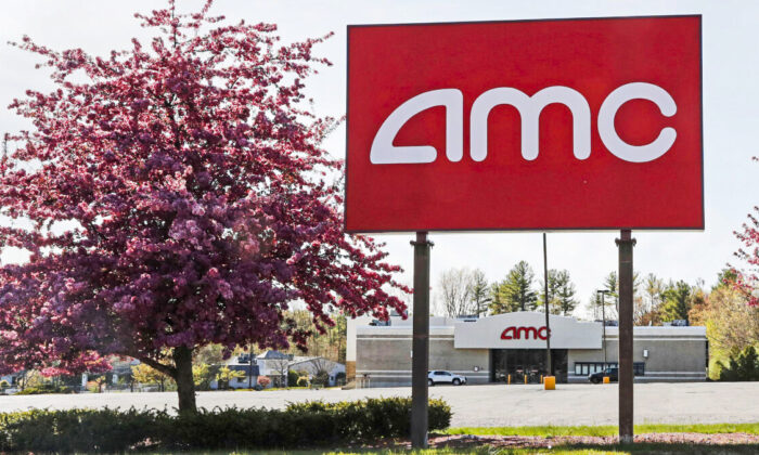 An AMC theater sign at a nearly empty parking lot for the theater in Londonderry, N.H., on May 14, 2020. (Charles Krupa/AP Photo)