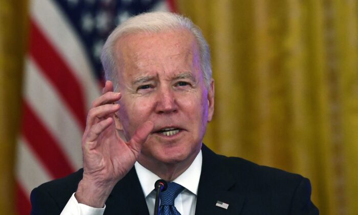 President Joe Biden speaks as he meets with members of his administration at the White House in Washington on Jan. 24, 2022. (Brendan Smialowski/AFP via Getty Images)