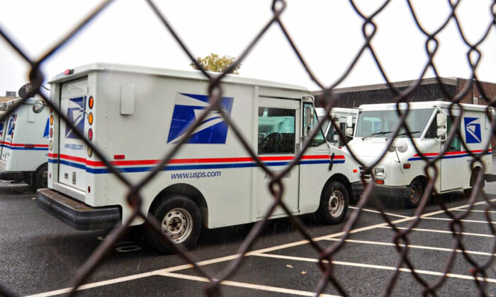U.S. Postal Service delivery trucks at the Manassas Post Office in Virginia in a 2011 file photograph. (Karen Bleier/AFP via Getty Images)