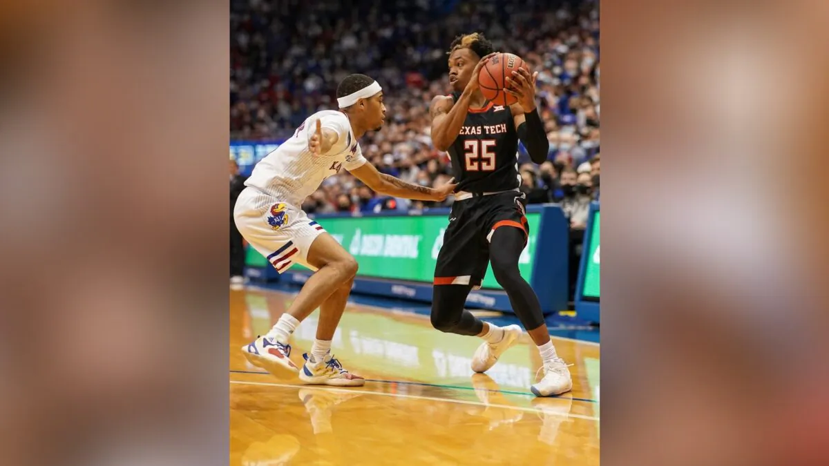 Texas Tech Red Raiders guard Adonis Arms (25) looks to pass as Kansas Jayhawks guard Dajuan Harris Jr. (3) defends during the first half at Allen Fieldhouse, in Lawrence, Kan., on Jan. 24, 2022. (Denny Medley/USA TODAY Sports via Field Level Media)