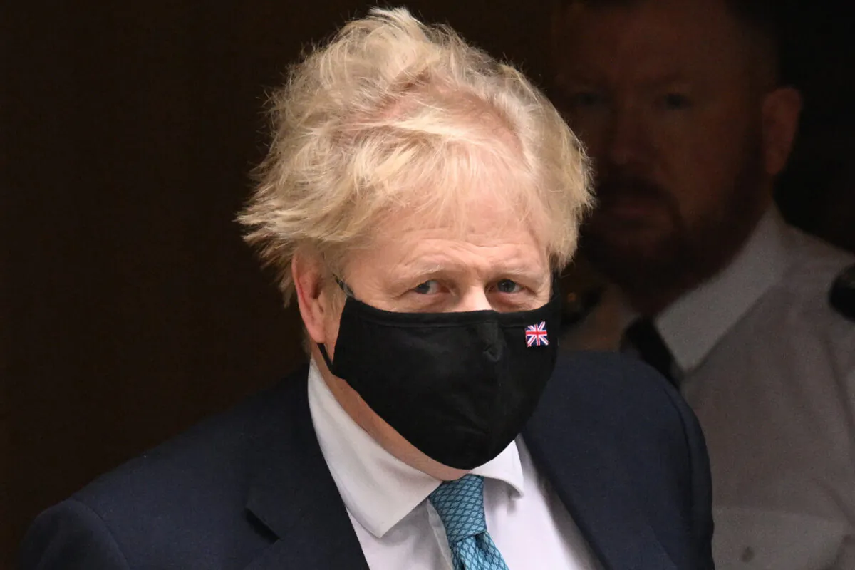 British Prime Minister Boris Johnson leaves 10 Downing Street to attend the weekly Prime Minister’s Questions in the House of Commons, in London, on Jan. 26, 2022. (Leon Neal/Getty Images)