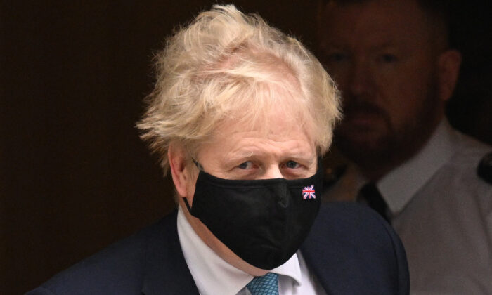 British Prime Minister Boris Johnson leaves 10 Downing Street to attend the weekly Prime Minister’s Questions in the House of Commons, in London, on Jan. 26, 2022. (Leon Neal/Getty Images)