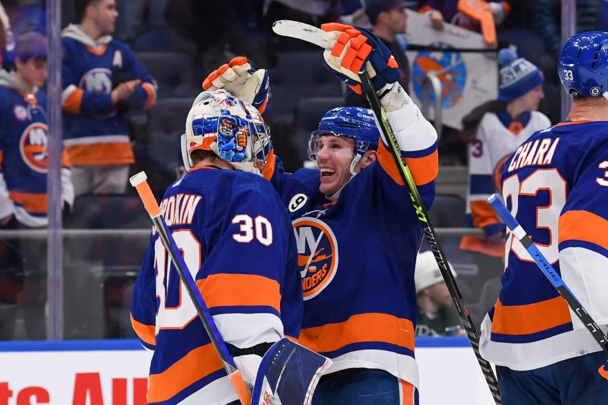 New York Islanders center Casey Cizikas (53) celebrates with goaltender Ilya Sorokin (30) after defeating the Philadelphia Flyers at UBS Arena, in Elmont, New York, on Jan. 25, 2022. (Dennis Schneidler/USA TODAY Sports via Field Level Media)