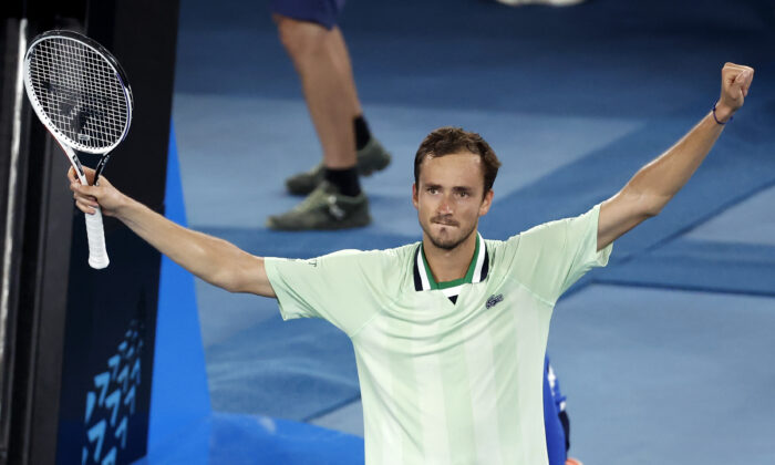 Daniil Medvedev of Russia celebrates after defeating Felix Auger-Aliassime of Canada, in their quarterfinal match at the Australian Open tennis championships in Melbourne, on Jan. 27, 2022. (Hamish Blair/AP Photo)