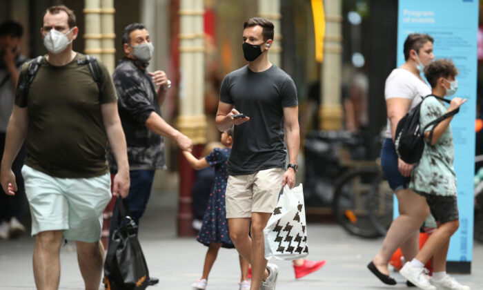 A shopper walks in Sydney's CBD, Australia, on Dec. 24, 2021. (Jason McCawley/Getty Images)