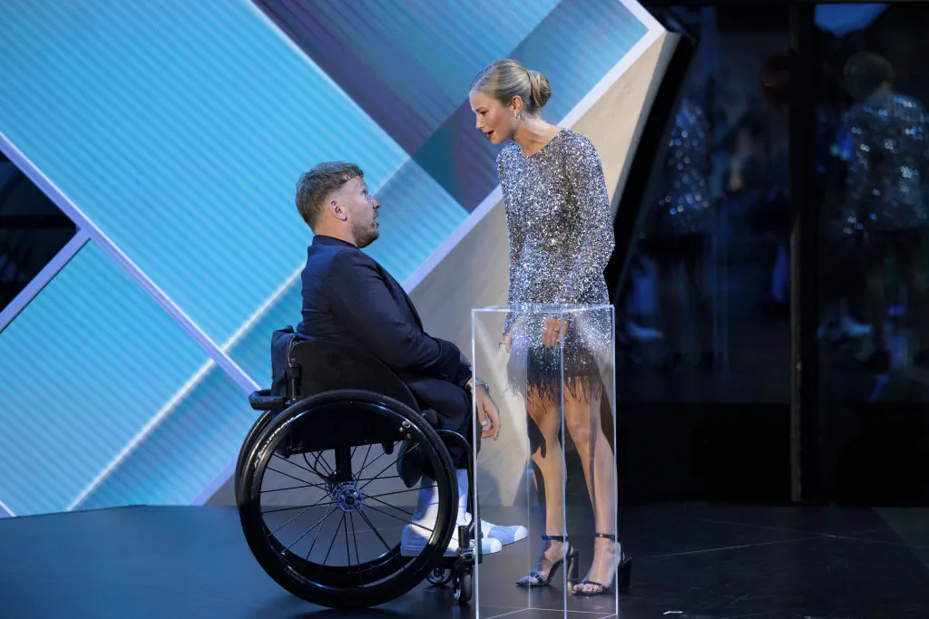 Australian of the year Dylan Alcott greets Grace Tame at the 2022 Australian of the Year Awards at the National Arboretum on January 25, 2022 in Canberra, Australia. (Photo by Brook Mitchell/Getty Images)