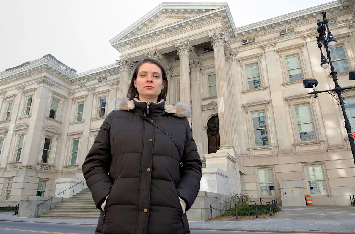 Unvaccinated elementary school teacher Nadia Lyakhnovich in front of one of New York's Department of Education buildings. (Dave Paone/The Epoch Times)