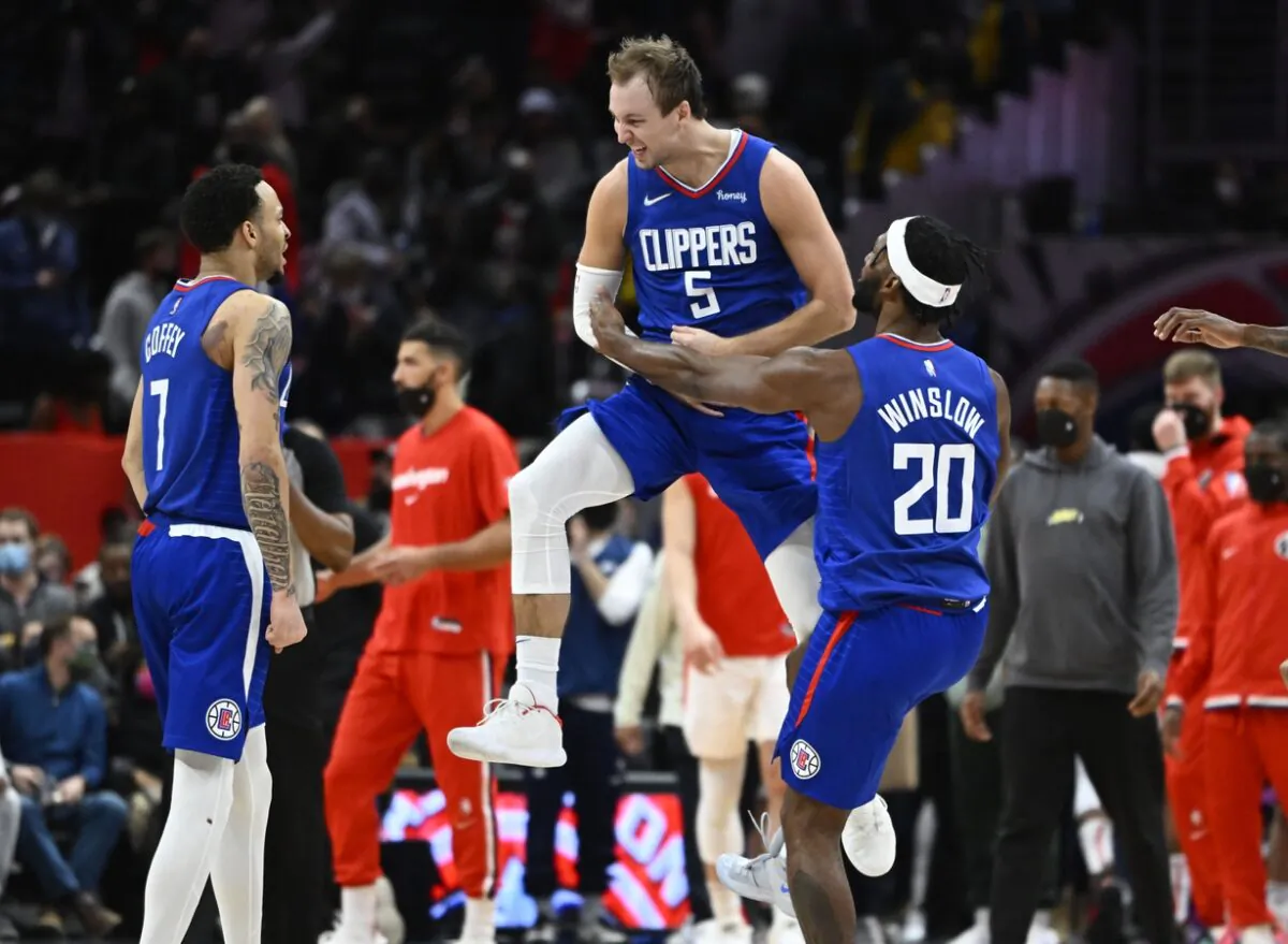 LA Clippers guard Luke Kennard (5) reacts after making a three-point basket while being fouled late in the fourth quarter against the Washington Wizards at Capital One Arena, in Washington, on Jan. 25, 2022. (Brad Mills/USA TODAY Sports via Field Level Media)