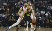 Curry and Warriors Rout Mavericks 130–92