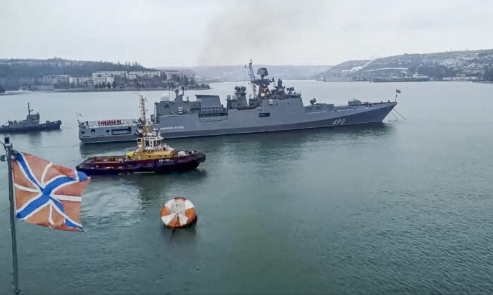 The Russian navy's frigate Admiral Essen prepares to sail off for an exercise in the Black Sea in this photo taken from video and released by the Russian Defense Ministry Press Service on Jan. 26, 2022. (Russian Defense Ministry Press Service via AP)