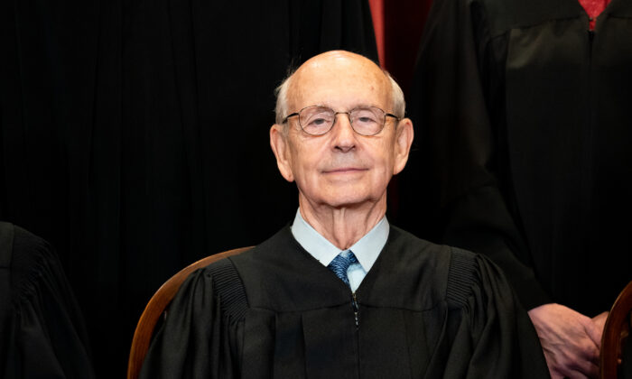 Associate Justice Stephen Breyer sits during a group photo of the Justices at the Supreme Court in Washington on April 23, 2021. (Erin Schaff/Pool/Getty Images)