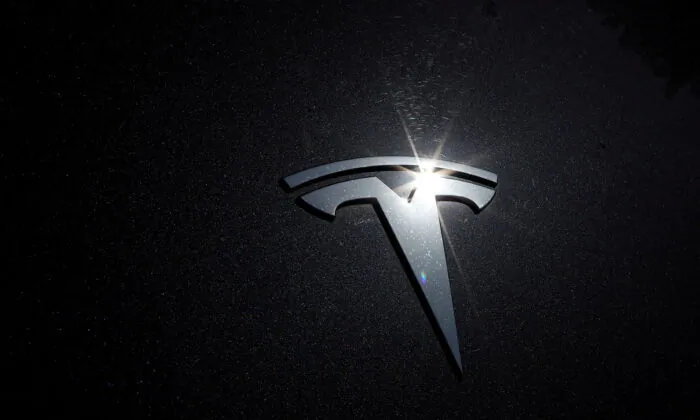 The Tesla logo is seen on a car in Los Angeles, Calif., on July 9, 2020.  (Lucy Nicholson/Reuters File Photo)