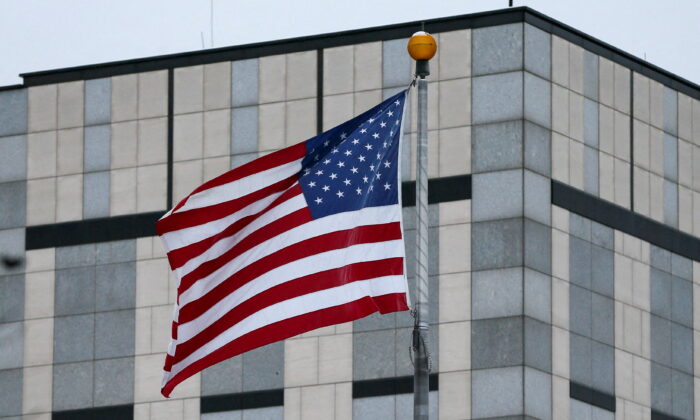 A flag waves in the wind at the U.S. embassy in Kyiv, Ukraine, on Jan. 24, 2022. (Gleb Garanich/Reuters)