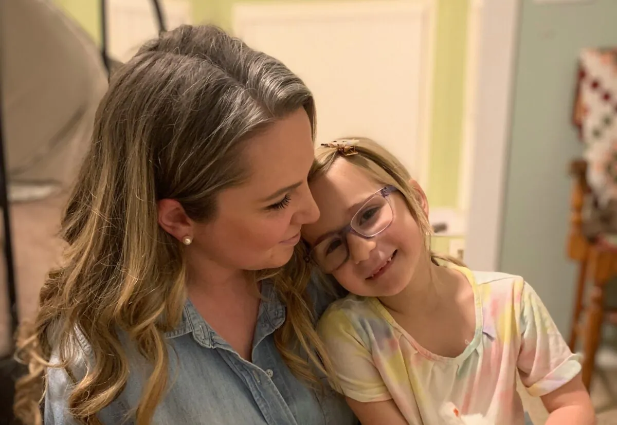 Laura Ziemer and her daughter, who was denied an appointment with her eye doctor at West Coast Vision for being unvaccinated. (Handout)