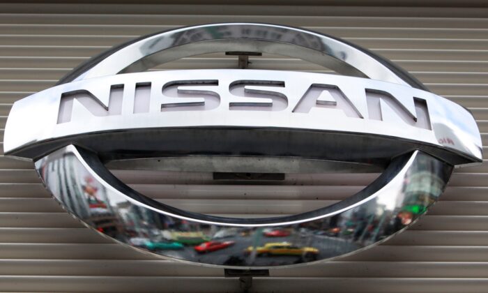 The logo of the Nissan Motors Co. is shown a showroom in Tokyo's Ginza shopping district, on Feb. 8, 2012. (Shizuo Kambayashi/AP Photo)