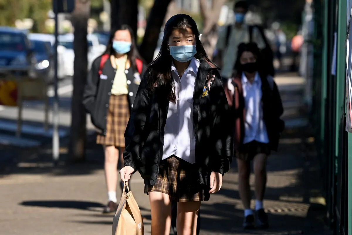 Students wearing face masks as they return to school at Fairvale High School in Sydney, Australia on Oct. 25, 2021. (AAP Image/Bianca De Marchi)