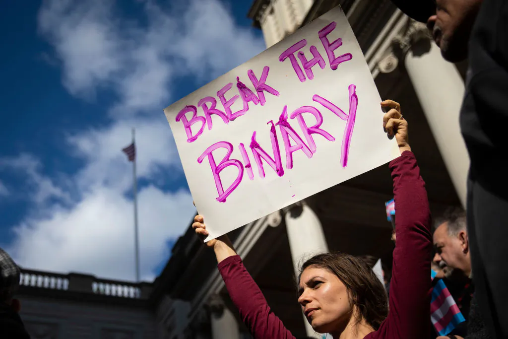 Activists rally to support transgender people on the steps of the City Hall, in New York, on Oct. 24, 2018. (Drew Angerer/Getty Images)