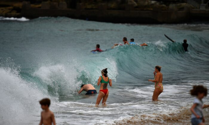 Residents swim at Coogee Beach in Sydney on April 20, 2020. (Saeed Khan/Getty Images)