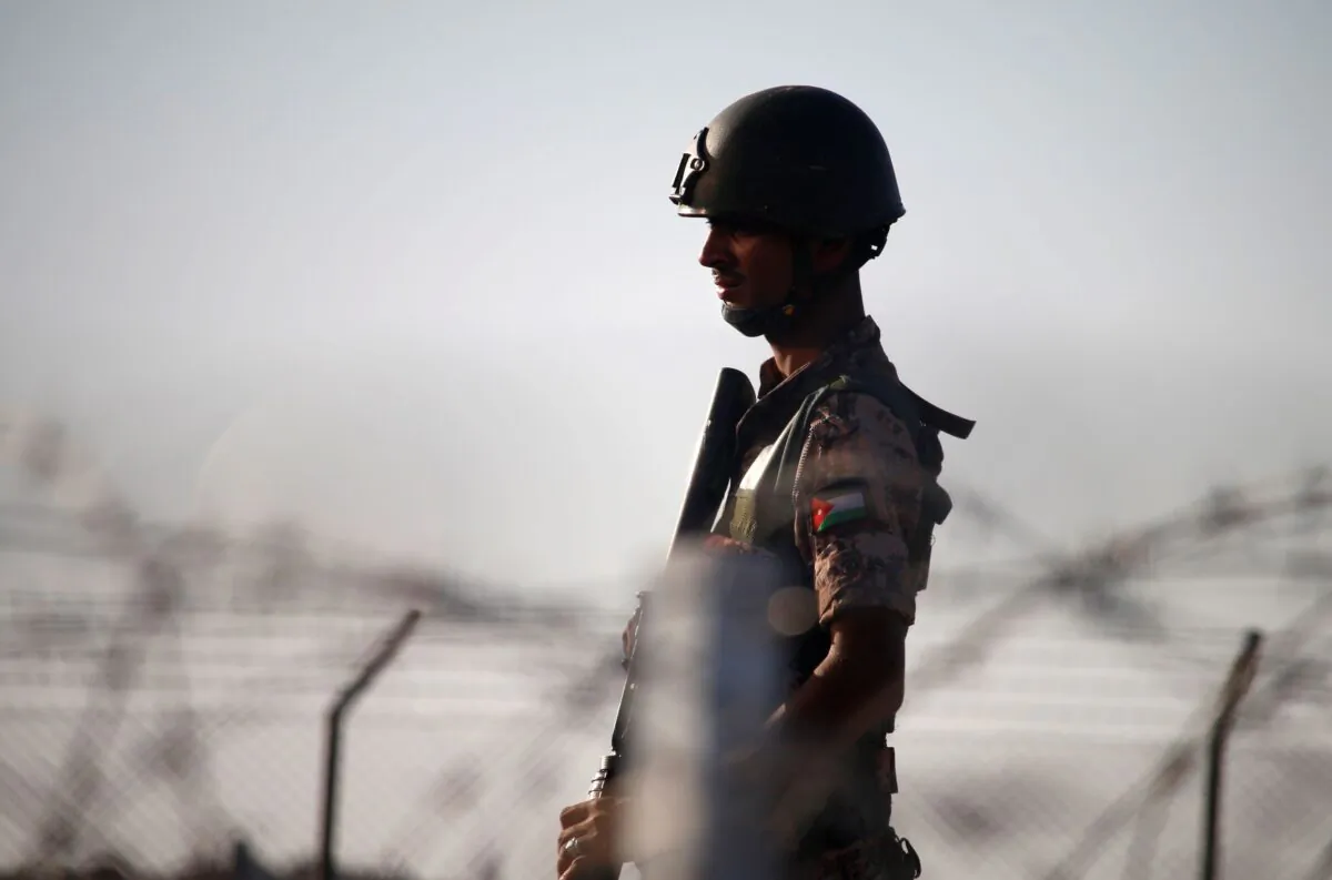 A Jordanian soldier keeps watching at the border between Syria and Jordan, near the town of Nassib, Syria, on July 2, 2018. (Mohamad Abazeed/AFP via Getty Images)