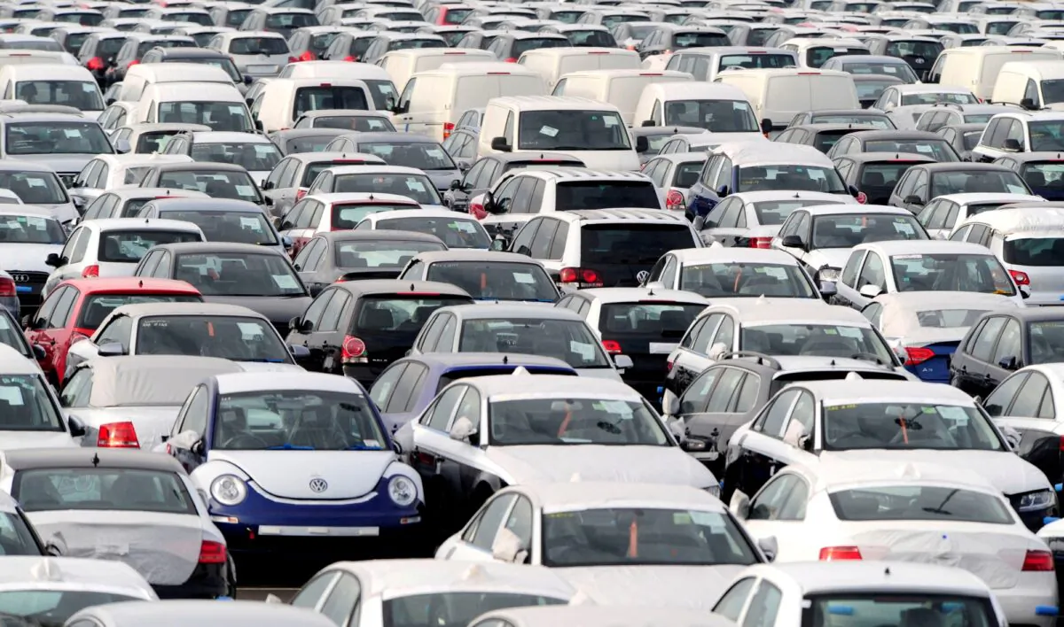 New cars are parked at a dockyard in Grimsby, northern England, on Jan 30, 2009. (Nigel Roddis/Reuters)
