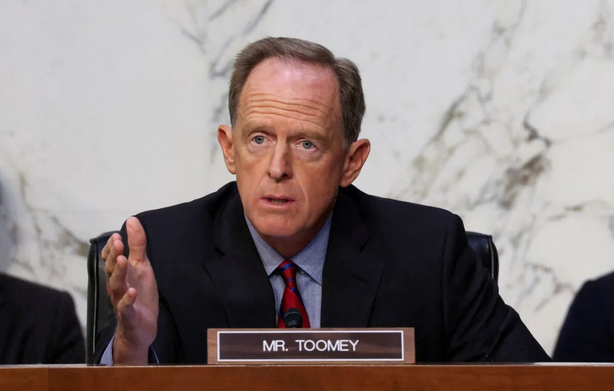 Ranking member Sen. Pat Toomey (R-Pa.) questions Treasury Secretary Janet Yellen and Federal Reserve Chairman Jerome Powell during a Senate Banking, Housing, and Urban Affairs Committee hearing on the CARES Act, at the Hart Senate Office Building in Washington on Sept. 28, 2021. (Kevin Dietsch/Reuters)