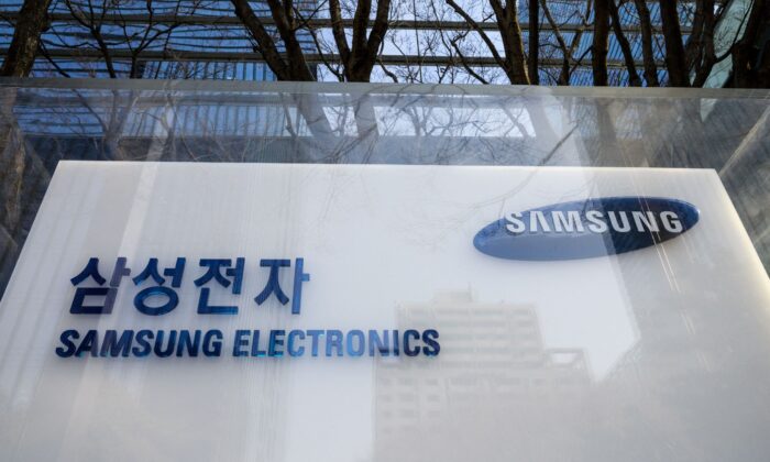 A signboard of Samsung Electronics is seen displayed outside the company's Seocho building in Seoul, South Korea, on Jan. 27, 2022. (Anthony Wallace/AFP via Getty Images)