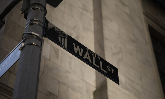A Wall Street sign outside the New York Stock Exchange, on Jan. 24, 2022. (Ed Jones/AFP via Getty Images)