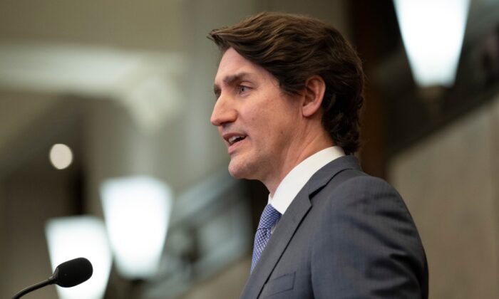 Canadian Prime Minister Justin Trudeau speaks following a cabinet retreat, Jan. 26, 2022 in Ottawa. (The Canadian Press/Adrian Wyld)