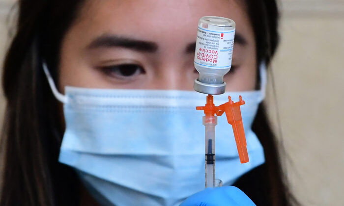 Moderna's COVID-19 vaccine is prepared in Los Angeles, Calif., on Jan. 7, 2022. (Frederic J. Brown/AFP via Getty Images)