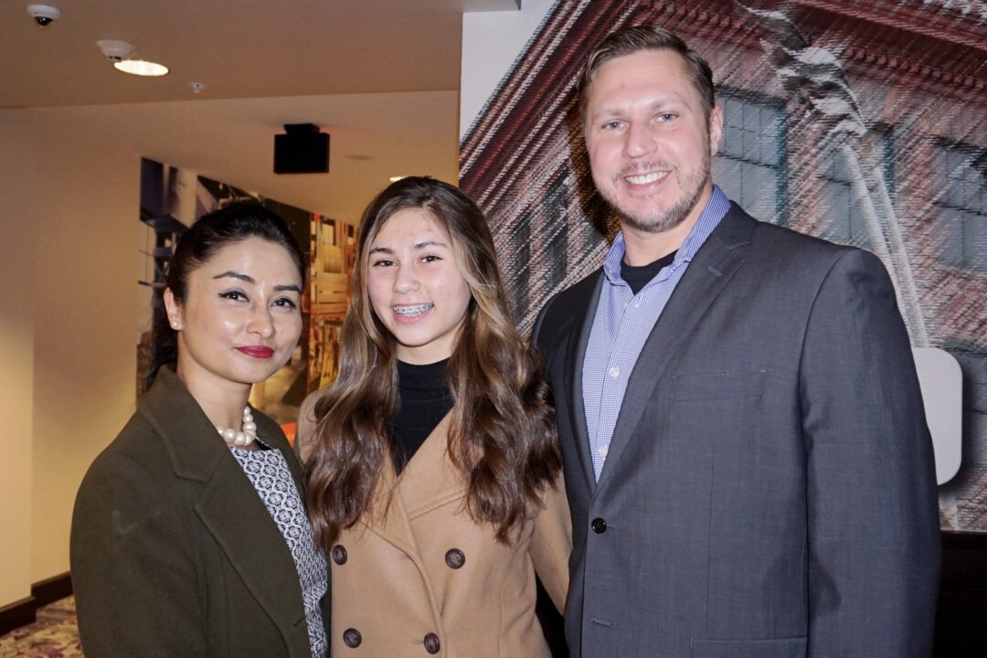 Radhika, Erica and Nathan Rosenberg at the Shen Yun Performing Arts performance at Mary W. Sommervold Hall at Washington Pavilion, on Jan. 26, 2022. (Sally Sun/The Epoch Times)