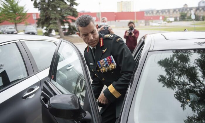 Maj.-Gen. Dany Fortin leaves the Gatineau Police Station after being processed, in Gatineau, Que., on Aug. 18, 2021. (The Canadian Press/Justin Tang)