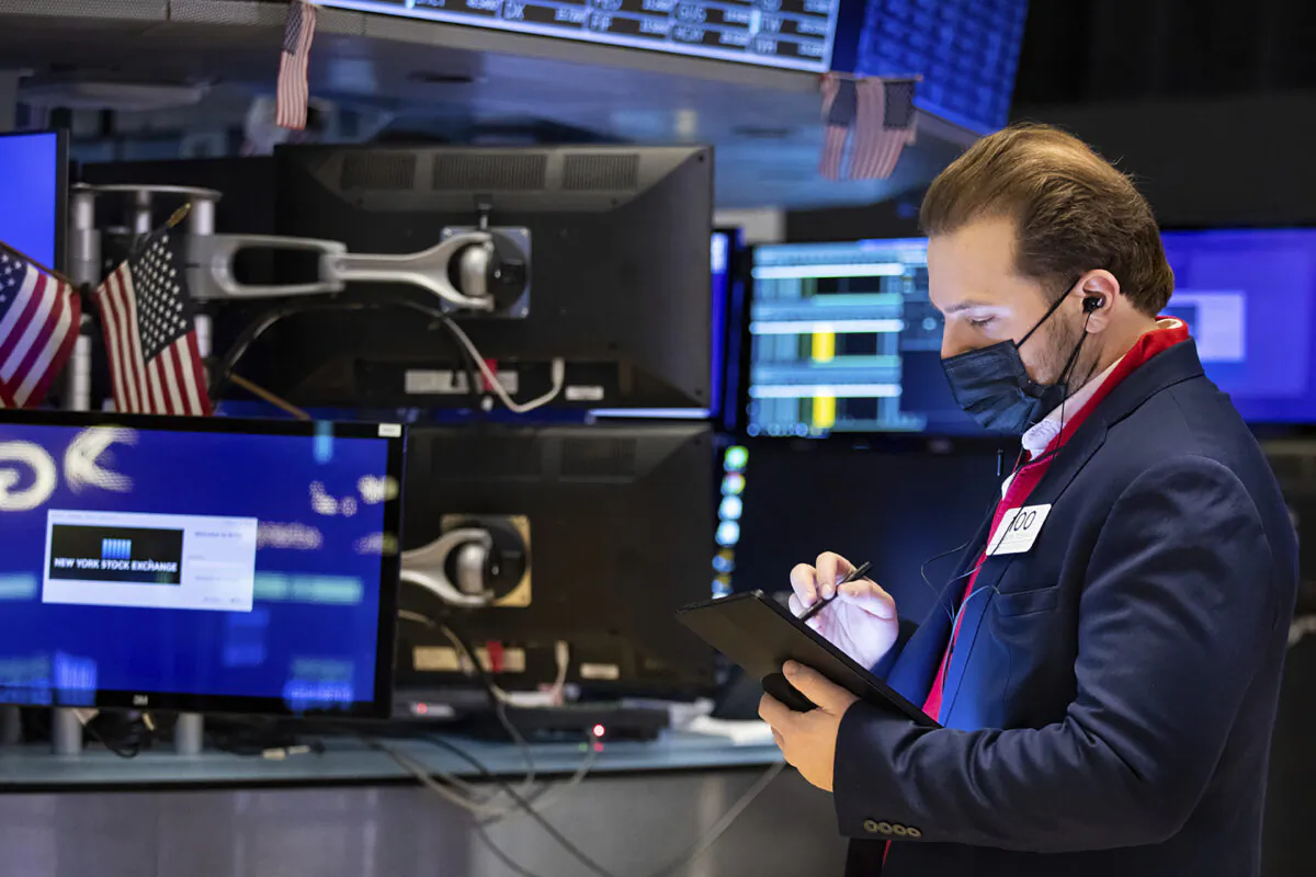 Trader Ben Tuchman works on the floor, in New York Stock Exchange in New York City, on Jan. 28, 2022. (Allie Joseph/New York Stock Exchange via AP)