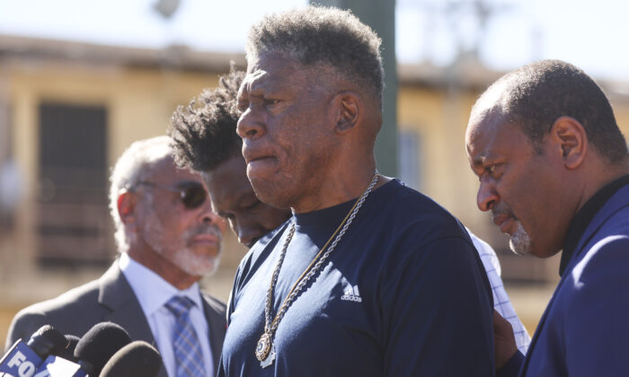 Marvin Kincy (C), Tioni's uncle, speaks at a press conference before the funeral for 16-year-old Tioni Theus in Los Angeles on Jan. 27, 2022. (Mario Tama/Getty Images)