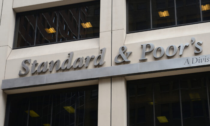 A sign for Standard & Poor's rating agency stands in front of the company headquarters in New York, on Sep. 18, 2012. (Emmanuel Dunand/AFP via Getty Images)