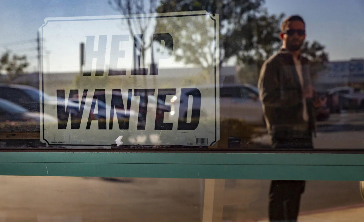 A help wanted sign is displayed in Fountain Valley, Calif., on Jan. 27, 2022. (John Fredricks/The Epoch Times)