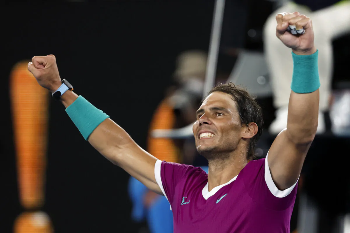 Rafael Nadal of Spain celebrates after defeating Matteo Berrettini of Italy in their semifinal match at the Australian Open tennis championships in Melbourne, Australia, on Jan. 28, 2022. (Hamish Blair/AP Photo)