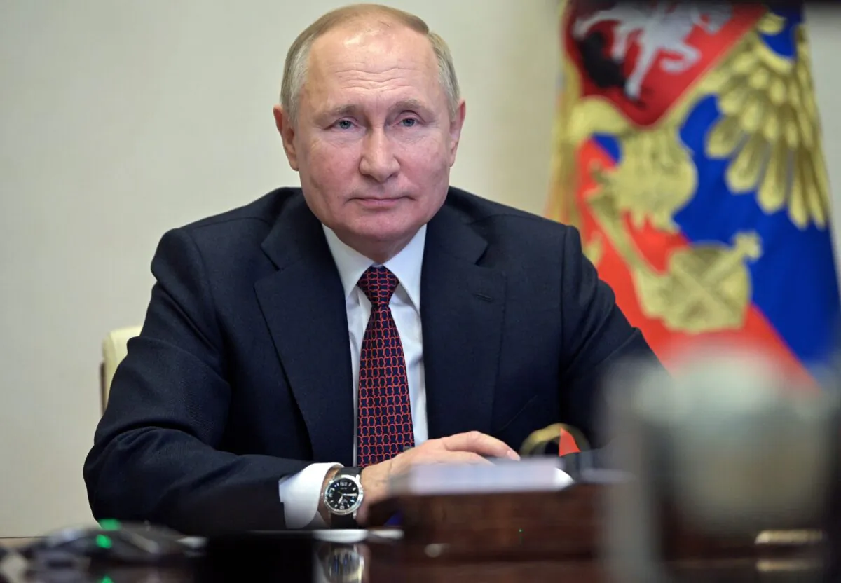 Russian President Vladimir Putin attends a meeting with university students at Novo-Ogaryovo state residence, outside Moscow, on Jan. 25, 2022. (Alexey Nikolsky/Sputnik/AFP via Getty Images)